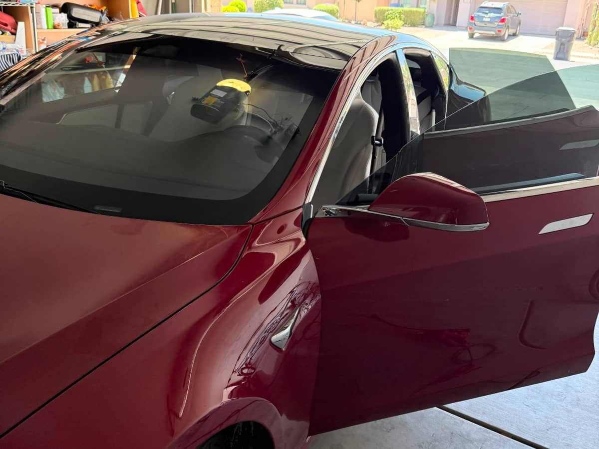 Red Tesla 20% tinted windows